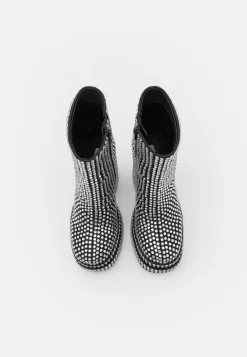 Steve Madden Enkellaarsjes Met Hoge Hak - Black -Winkel voor modeartikelen 27ed29cb84df4429801ab6b90d220719 scaled