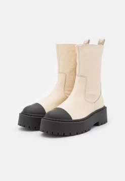 Steve Madden Genna - Enkellaarsjes Met Plateauzool - Bone/Black -Winkel voor modeartikelen 57f7797b0a2142f98fa8658dedf6b993 scaled