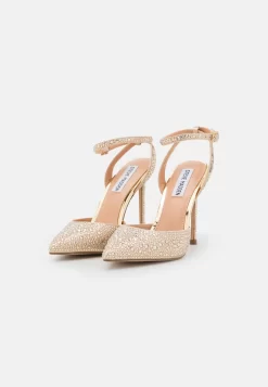 Steve Madden Revert - Sandalen - Gold 8 Steve Madden Revert - Sandalen - Gold -Winkel voor modeartikelen 8d3c0bac4435485281fe80cf99755e09 scaled